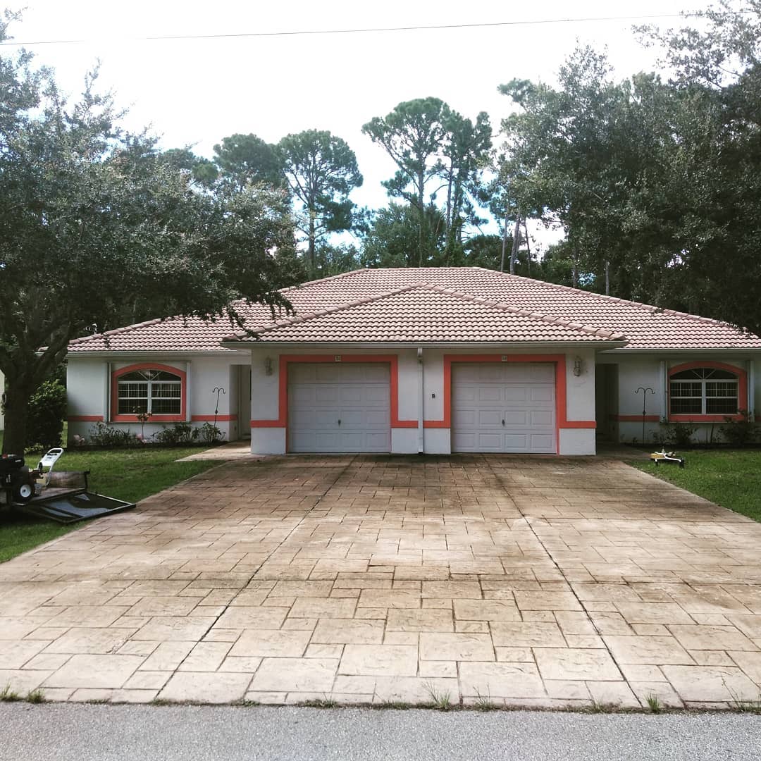 Tile roof and driveway after cleaning